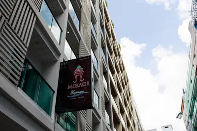 a sign on the side of a building at Mirage Express Patong Phuket Hotel in Patong Beach