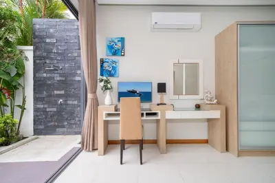 a home office with a desk and a mirror at Relax & Enjoy Stay! Elegant 3BR Pool Villa Talosy in Rawai Beach