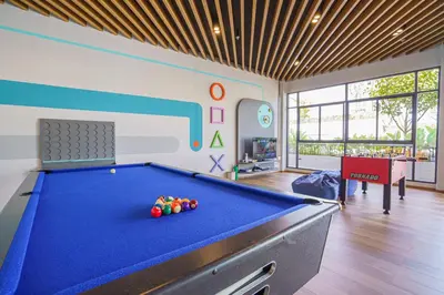 a billiard room with a pool table in it at HOMA Phuket Town in Phuket Town