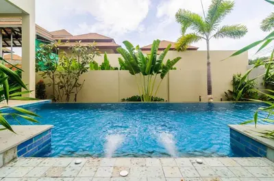 a swimming pool in the backyard of a house at Shanti Villas x MonthStayZ Thailand in Rawai Beach