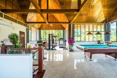 a large room with a pool table in it at Villa Stan in Kamala Beach
