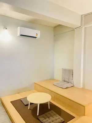 a small room with a table and a heater at THE BELONG BOUTIQUE HOTEL in Phuket Town