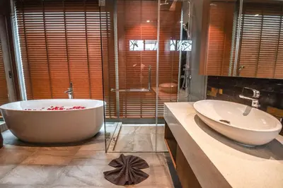 a bathroom with a large tub and a sink at Shambhala grand villa by Cozy Lake in Bang Tao Beach