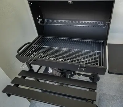a grill sitting on a rack in a room at Villa Ayan, Amazing Pool, 2 bedrooms Near Nai harn Beach in Rawai Beach