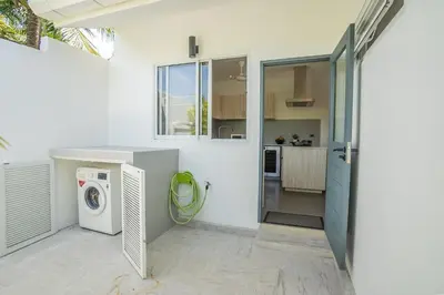 a white laundry room with a washer and dryer at Villa Ayan, Amazing Pool, 2 bedrooms Near Nai harn Beach in Rawai Beach