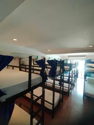 a group of bunk beds in a room at Popeyes Hostel Patong in Patong Beach
