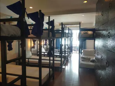 a group of bunk beds in a room at Popeyes Hostel Patong in Patong Beach