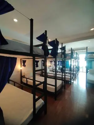 a group of bunk beds in a room at Popeyes Hostel Patong in Patong Beach