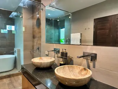two sinks on a counter in a bathroom at Villa Tara nr Layan Beach in Bang Tao Beach