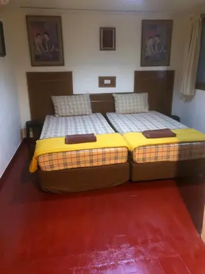 two beds sitting next to each other in a bedroom at Phi Phi Dream Guest House in Phi Phi Don