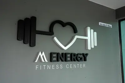 a sign for a therapy fitness center on a wall at Suite Calista 2BRView JacuzziMida Grande Surin in Surin Beach