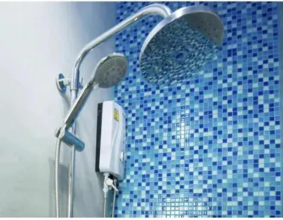 a shower with a shower head in a bathroom at AT SEA Patong in Patong Beach