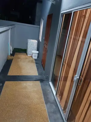 a hallway of a house with a door and a toilet at Новый дом 106 м2, территория 160 м2 и своя парковка in Phuket Town
