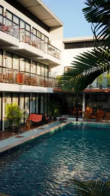 a swimming pool in front of a building at Z&Z House in Rawai Beach
