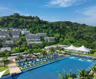 an aerial view of the resort with a large swimming pool at Hyatt Regency Phuket Resort in Kamala Beach