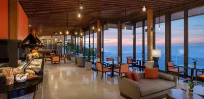 a hotel lobby with a view of the ocean at Hyatt Regency Phuket Resort in Kamala Beach