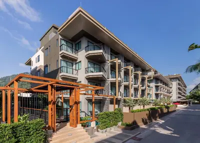 an image of a building with a building at The Charm Resort Phuket in Patong Beach