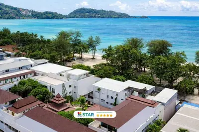 an aerial view of the beach and buildings at Quality Beach Resorts and Spa Patong in Patong Beach