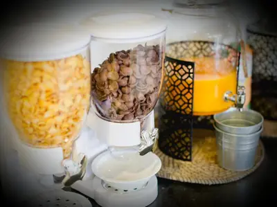 a food processor with food in it next to a drink at Anchor Boutique House in Patong Beach