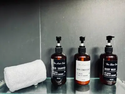 three bottles of soap and a roll of paper towels at Tropical 3BR Holiday Villa with Pool, BBQ, and Shaded Patio within Walking Distance to Bang Tao Beach in Bang Tao Beach