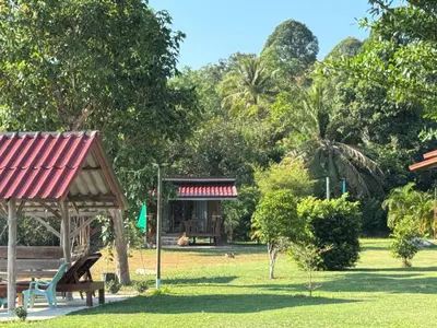 a park with a bench and a gazebo at Baan I Ta Lay Koh Yao Noi in Ko Yao Noi