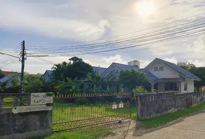 a house with a fence in front of it at Karon House 15B in Karon Beach