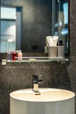 a sink in a bathroom with a mirror and a counter at Suite Celeste 1BR Sunset RooftopCitygate Kamala in Kamala Beach