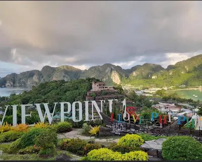 a view of a mountain with the word avalonopolis at PP Midnight Hotel in Phi Phi Don