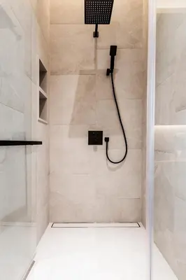 a bathroom with a shower with a glass door at Mono Oxygen Modern Pool Villas- Bangtao Beach in Phuket Town