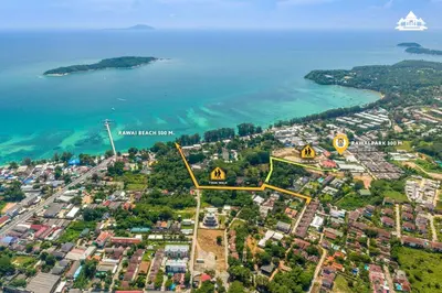 an aerial view of a city and the ocean at Rawai Private Villas - Pools and Garden in Rawai Beach