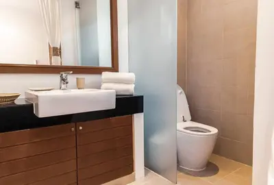 a bathroom with a sink and a toilet at The residence resort Villa 1bdr Private Pool in Phuket Town