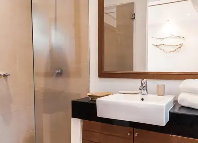 a bathroom with a white sink and a shower at The residence resort Villa 1bdr Private Pool in Phuket Town