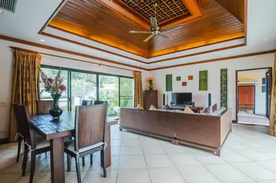 a large living room with a wooden ceiling at Lotus Pool Villa Your Own Slice Of Island Paradise in Rawai Beach