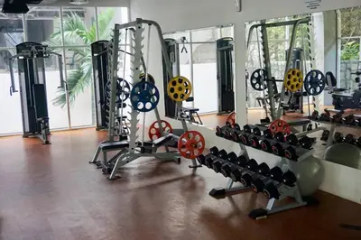 a gym with a bunch of treadmills and machines at Phuket Kamala, Spectacular Seaviews, Private pool, 3 BR in Kamala Beach
