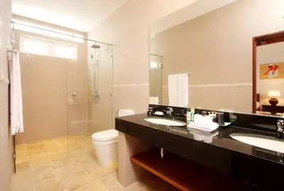 a bathroom with two sinks and a shower at Phuket Kamala, Spectacular Seaviews, Private pool, 3 BR in Kamala Beach