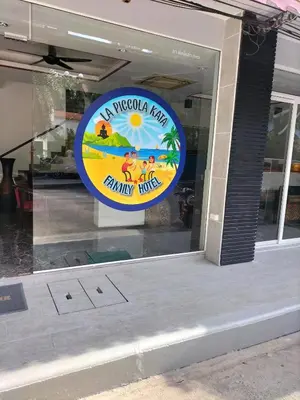 a sign in the window of a store at La Piccola Kata in Kata Beach