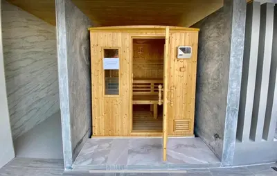 a wooden door in the middle of a room at Apartment in Aonang - great location with pool in Ao Nang Beach