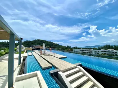 a pool on the roof of a building at The aristo-access pool room Surin beach in Phuket Town