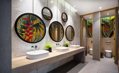 a bathroom with three sinks and mirrors on the wall at GLOW Mira Karon Beach in Karon Beach