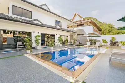 an image of a house with a swimming pool at Kamala Fantasy 5 Bedroom Modern Private Pool Villa in Kamala Beach
