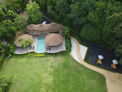 an overhead view of a house with a swimming pool at Touch Beachfront Pool Villa Koh Yao Noi in Ko Yao Noi
