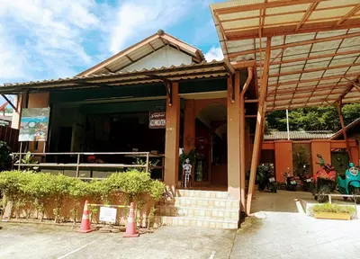 a building with a staircase in front of it at Phuket Siam Villas - SHA PLUS in Chalong