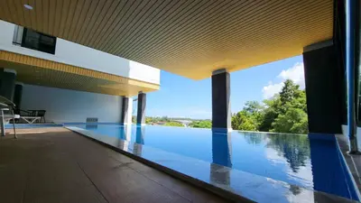 an infinity pool in a house with a view at VIP Great Hill Phuket Airport in Phuket Town