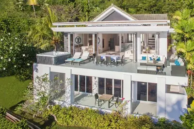 an aerial view of a house at Villa Nirvana - Beachfront Tropical Chic 4BR Haven in Cape Panwa, Phuket in Ban Ao Makham