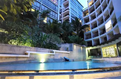 a fountain in the middle of a building at Deluxe apartment at Icon Park by Lofty in Kamala Beach