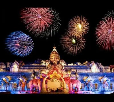 a temple with fireworks exploding in the sky at Cozy Home With Lake View at Kathu PHUKET 3 BR in Ban Huai Luk (1)