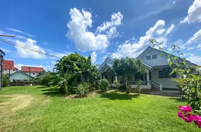 a view of a house with a yard at Karon House 15C in Karon Beach