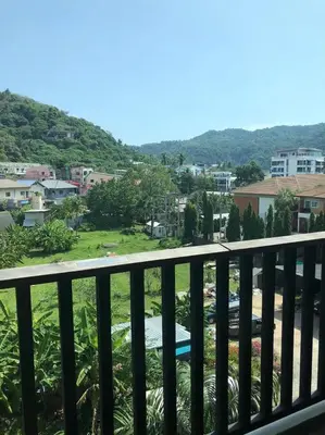 a view of the city from the balcony at The Beach by Glitter House in Kata Beach