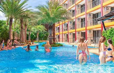 a group of people in the swimming pool at a resort at Квартира in Mai Khao Beach