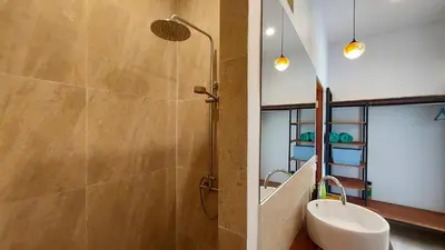 a bathroom with a shower and a toilet and a sink at 8 Palm Villa - Large Private Pool Villas in Aonang in Ao Nang Beach